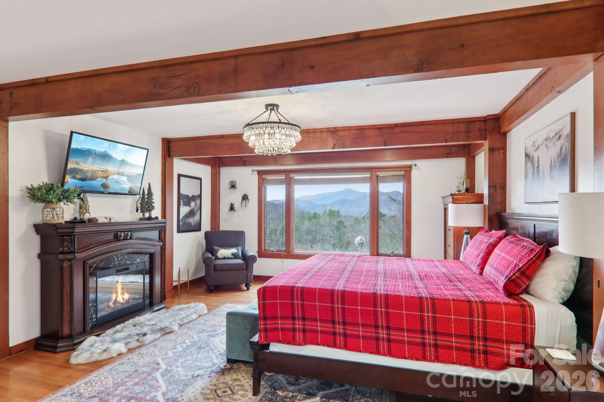 28 Nantahala Ridge Bryson City, NC 28713 - Photo 6 of 47 a bedroom with a bed and wooden floor