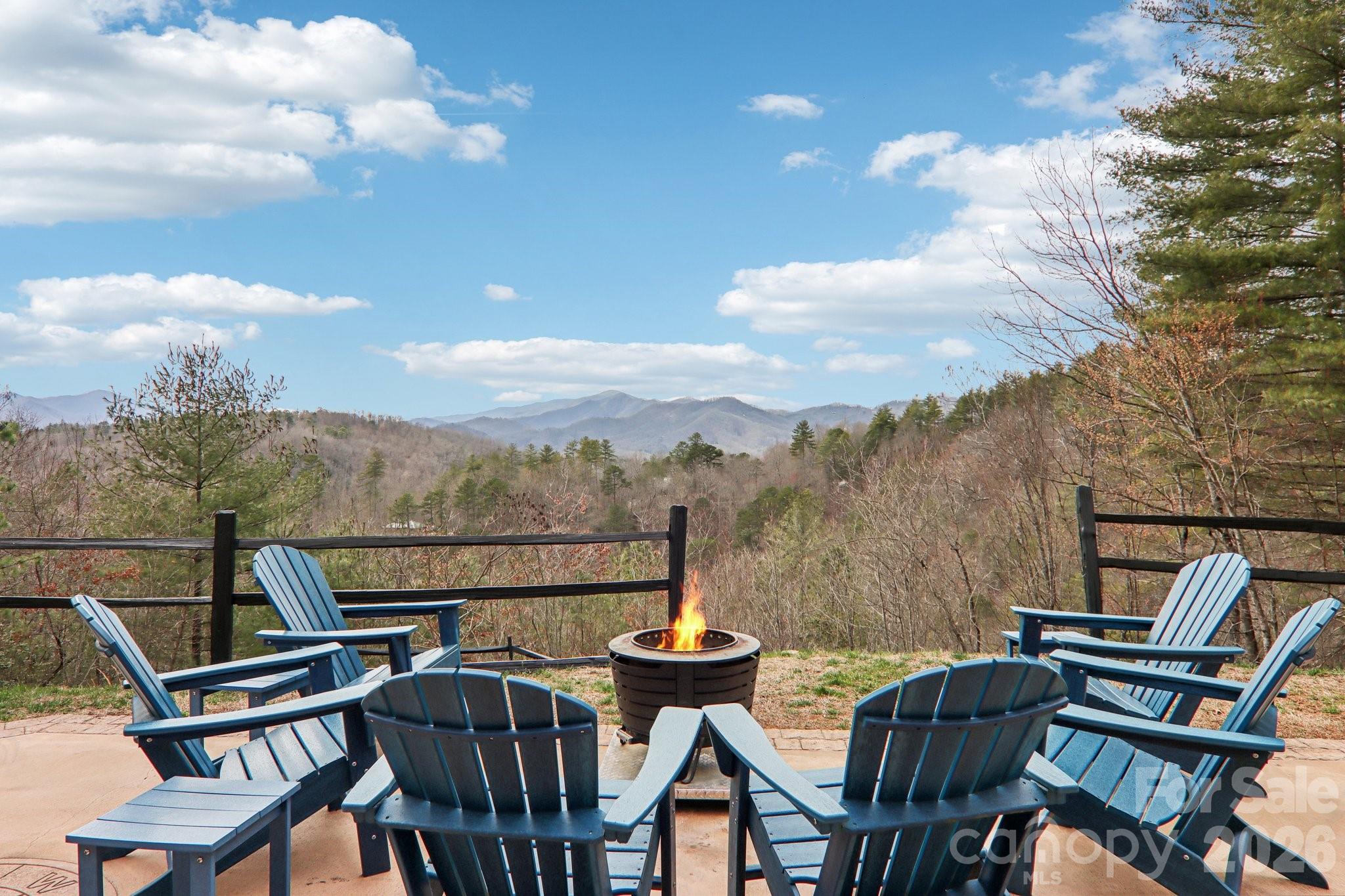 28 Nantahala Ridge Bryson City, NC 28713 - Photo 9 of 47 a view of a chairs and table in the balcony