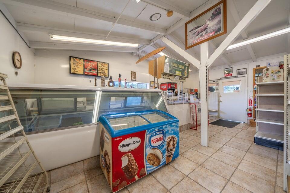 21785 Bend Ferry Road Red Bluff, CA 96080 - Photo 16 of 46 Deli case and freezer