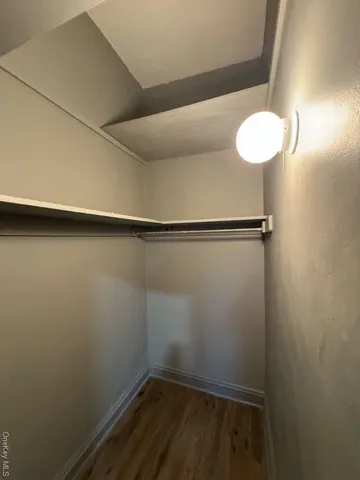 a view of a room with racks on the wall