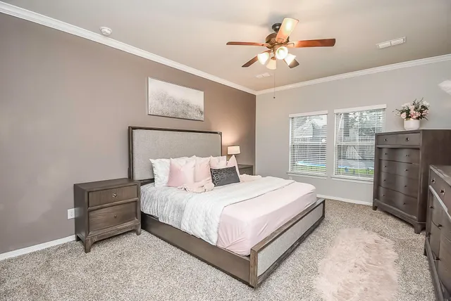 a bedroom with a bed and a fireplace