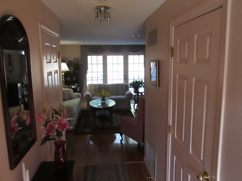 6 Holly Gate Circle, Unit 6 Middleton, MA 01949 - Photo 4 of 23 a view of a dining room with furniture