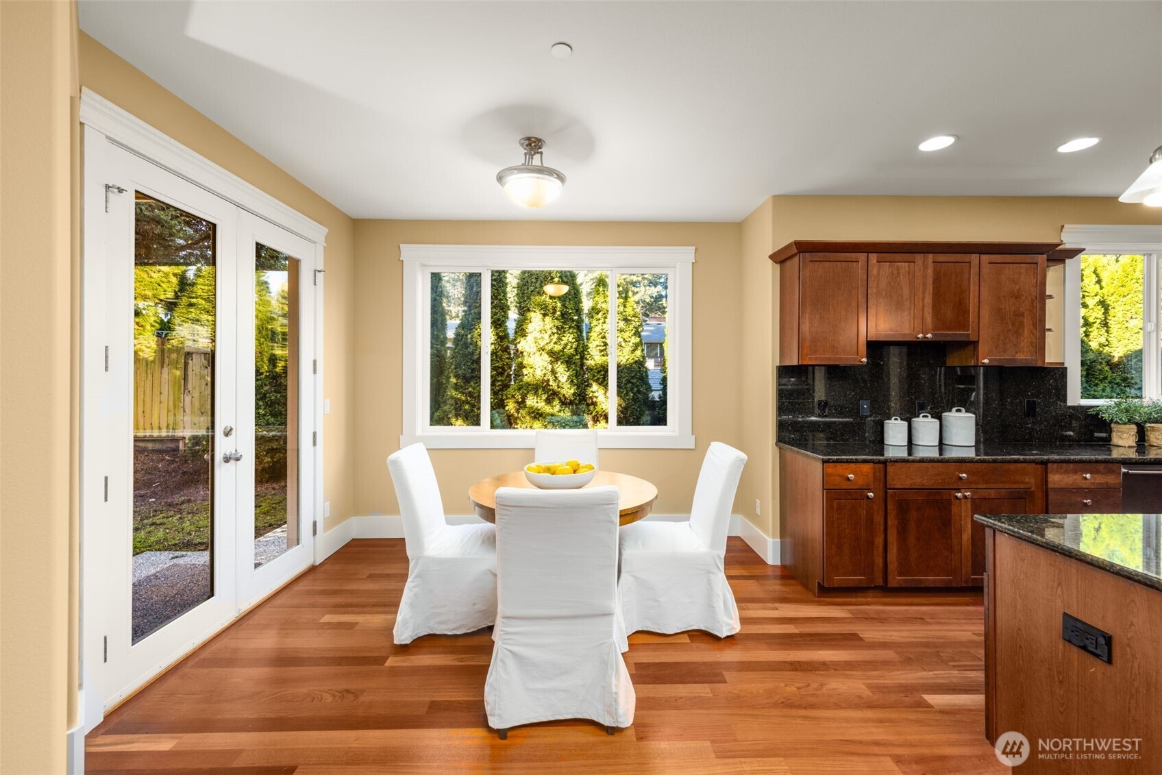 18638 92nd Avenue Northeast Bothell, WA 98011 - Photo 16 of 40 a view of a dining room with furniture window and outside view