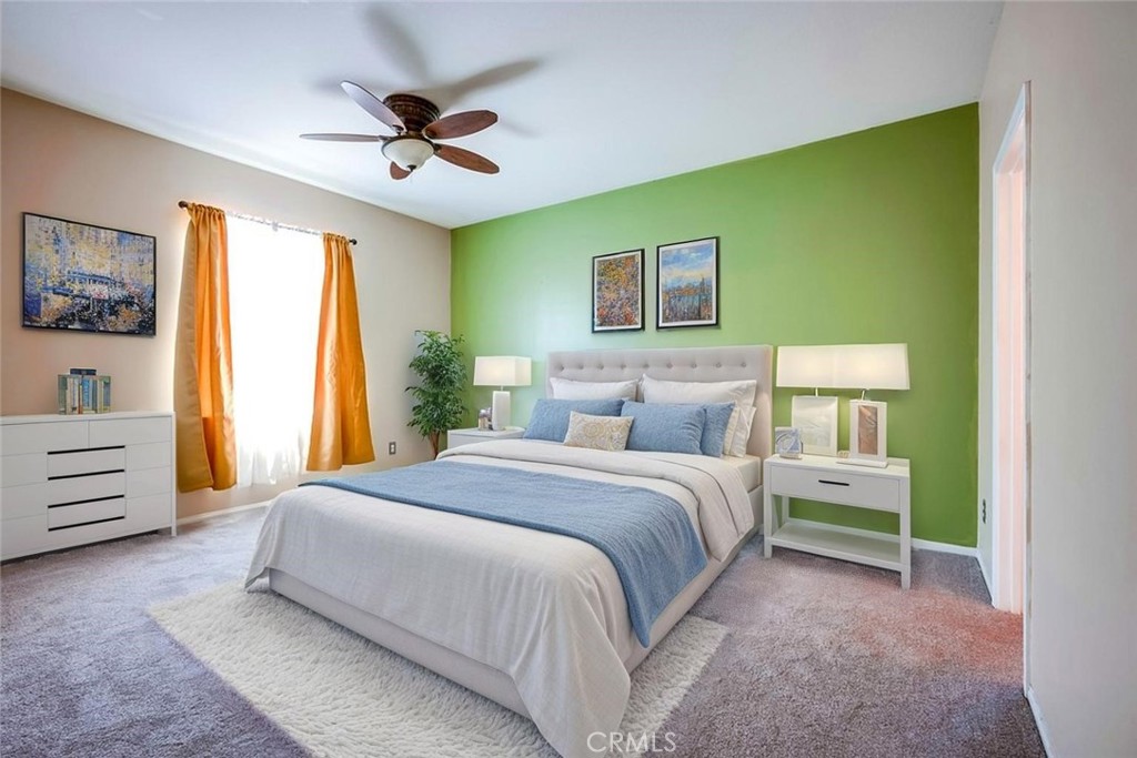 33409 Mesolite Way Menifee, CA 92584 - Photo 14 of 18 a bed room with a bed and a window