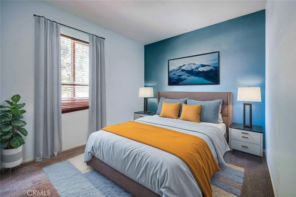 33409 Mesolite Way Menifee, CA 92584 - Photo 7 of 18 a bedroom with a bed and a potted plant