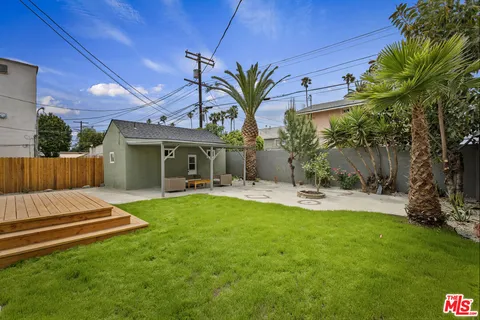 a view of a backyard with a patio