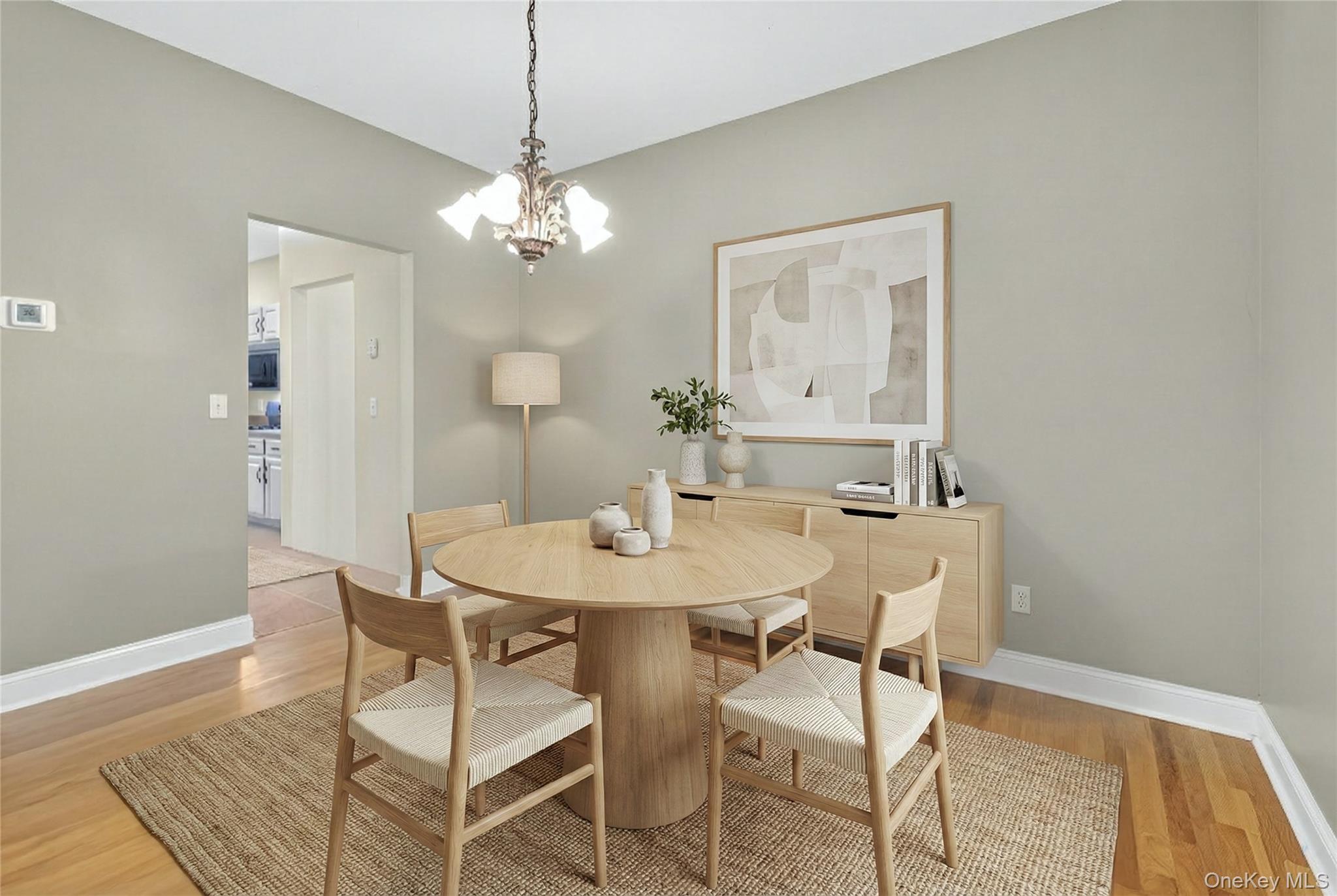 9 Exeter Circle Beacon, NY 12508 - Photo 15 of 41 a view of a dining room with furniture and wooden floor