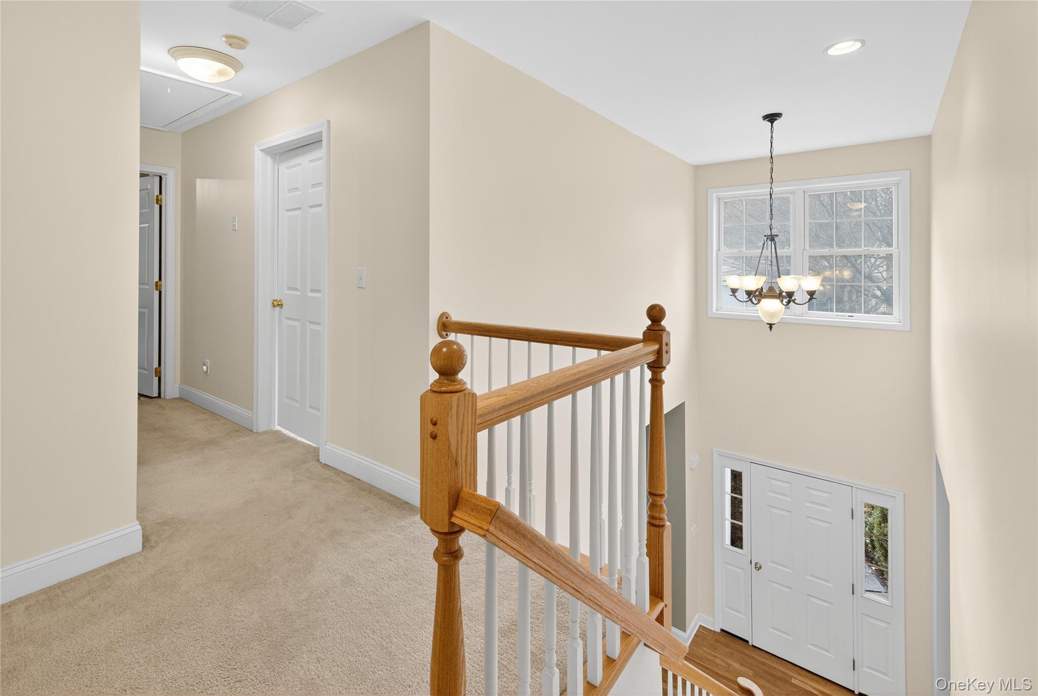 9 Exeter Circle Beacon, NY 12508 - Photo 19 of 41 a view of a hallway with a living room