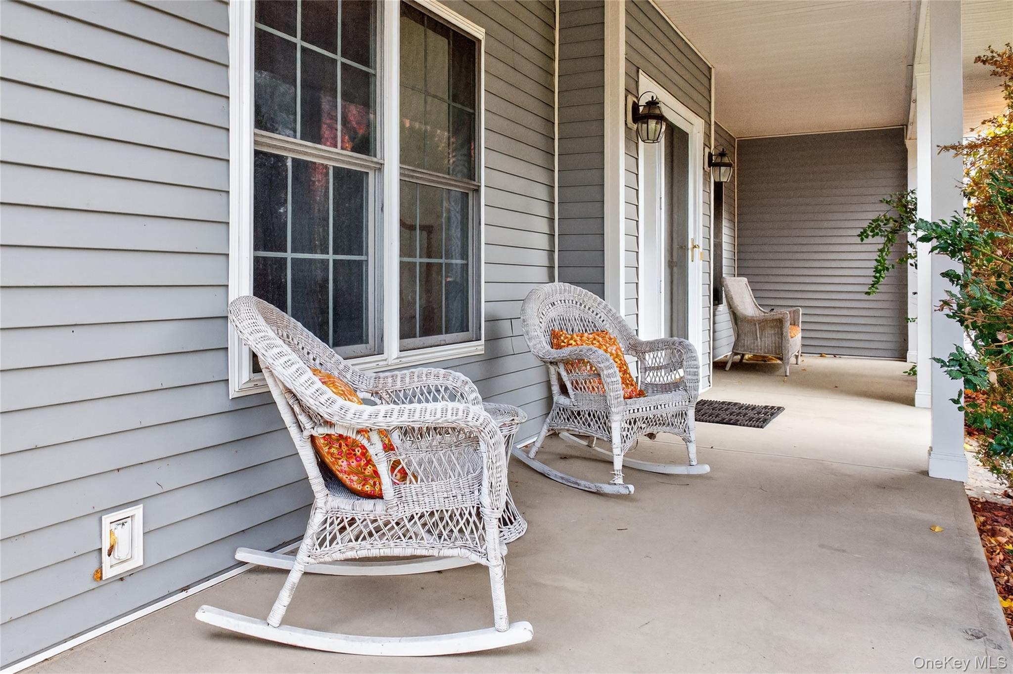 9 Exeter Circle Beacon, NY 12508 - Photo 2 of 41 a wooden bench sitting in front of a building