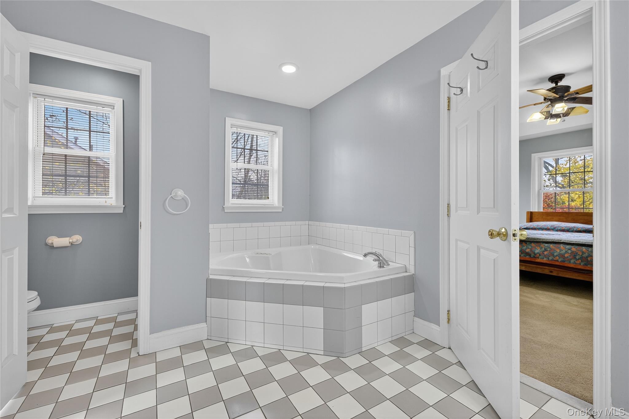 9 Exeter Circle Beacon, NY 12508 - Photo 23 of 41 a spacious bathroom with a tub shower and a sink