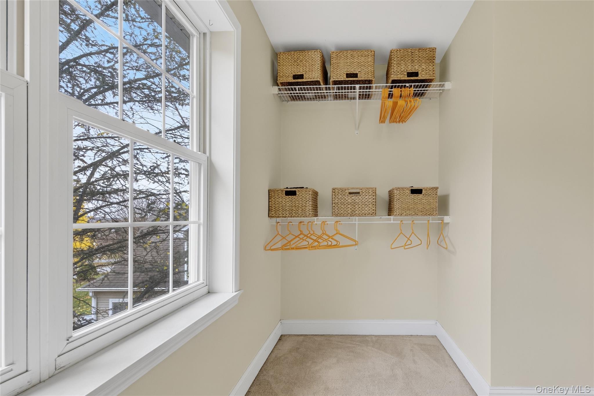9 Exeter Circle Beacon, NY 12508 - Photo 24 of 41 a view of a bathroom with a window and mirror