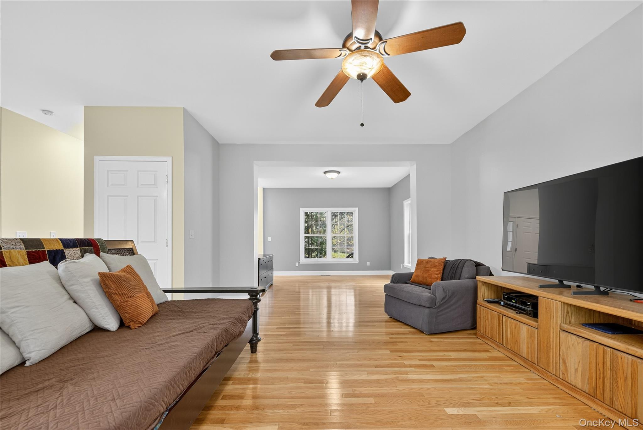 9 Exeter Circle Beacon, NY 12508 - Photo 8 of 41 a living room with furniture and a flat screen tv
