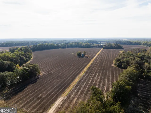 a view of balcony with furniture