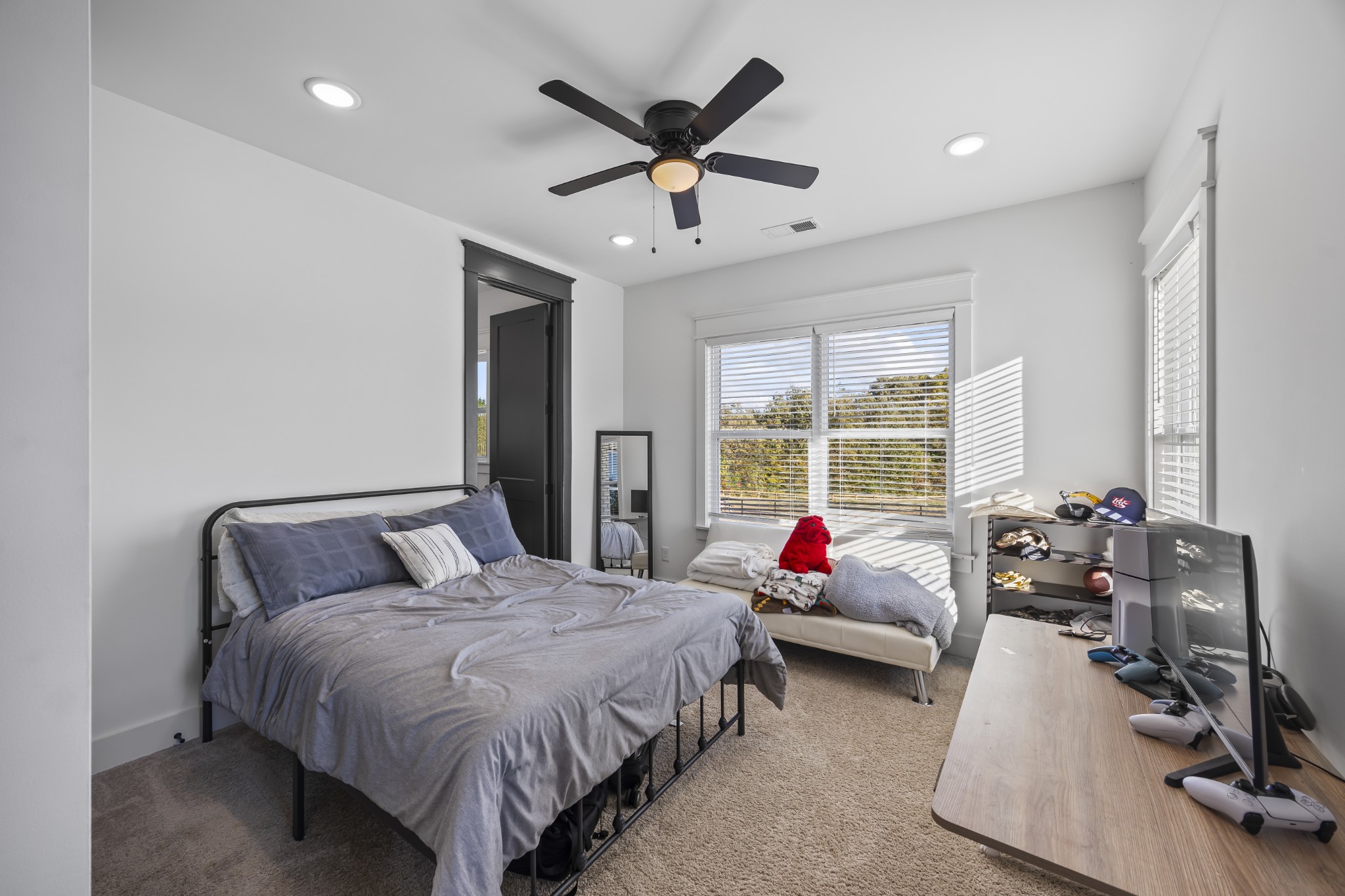 168 Huntersville Denmark Road Denmark, TN 38391 - Photo 31 of 41 a spacious bedroom with a bed and windows
