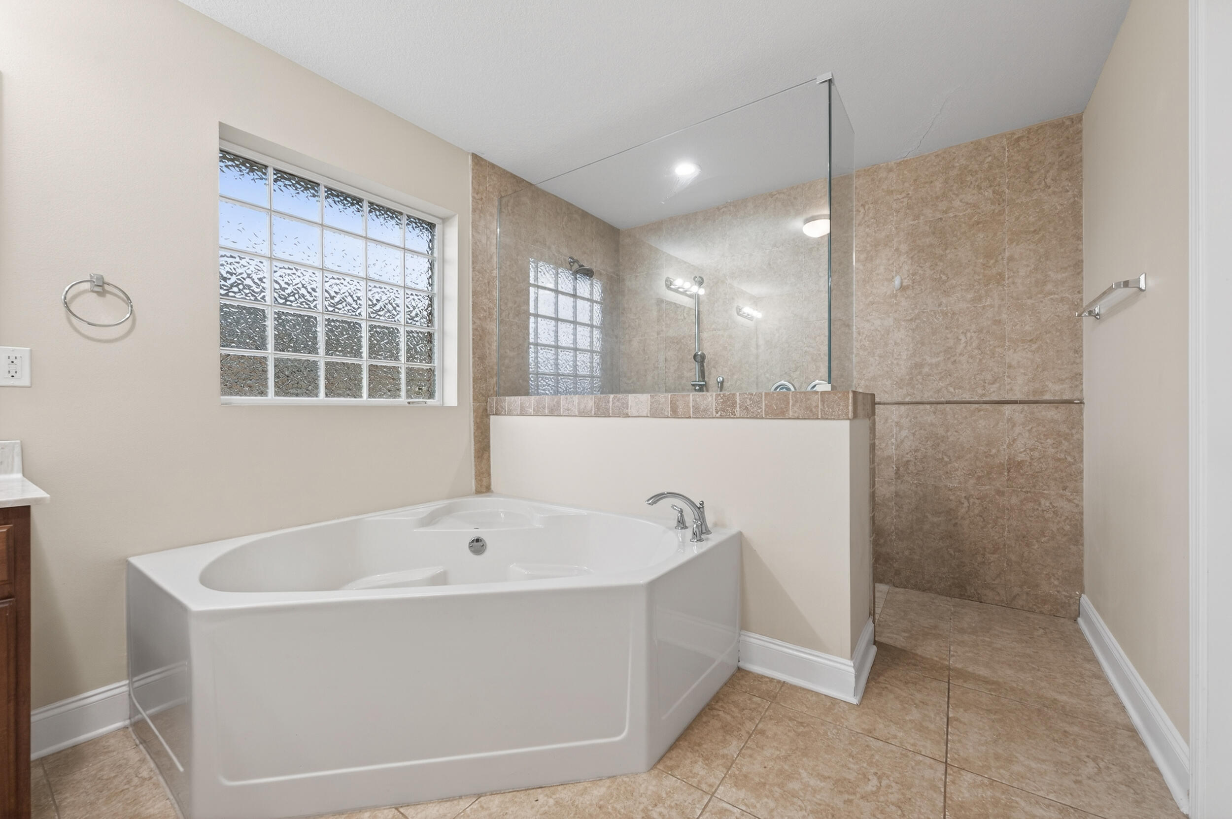 6210 Lapis Lane Crestview, FL 32539 - Photo 38 of 72 a white bath tub sitting in a bathroom next to a window