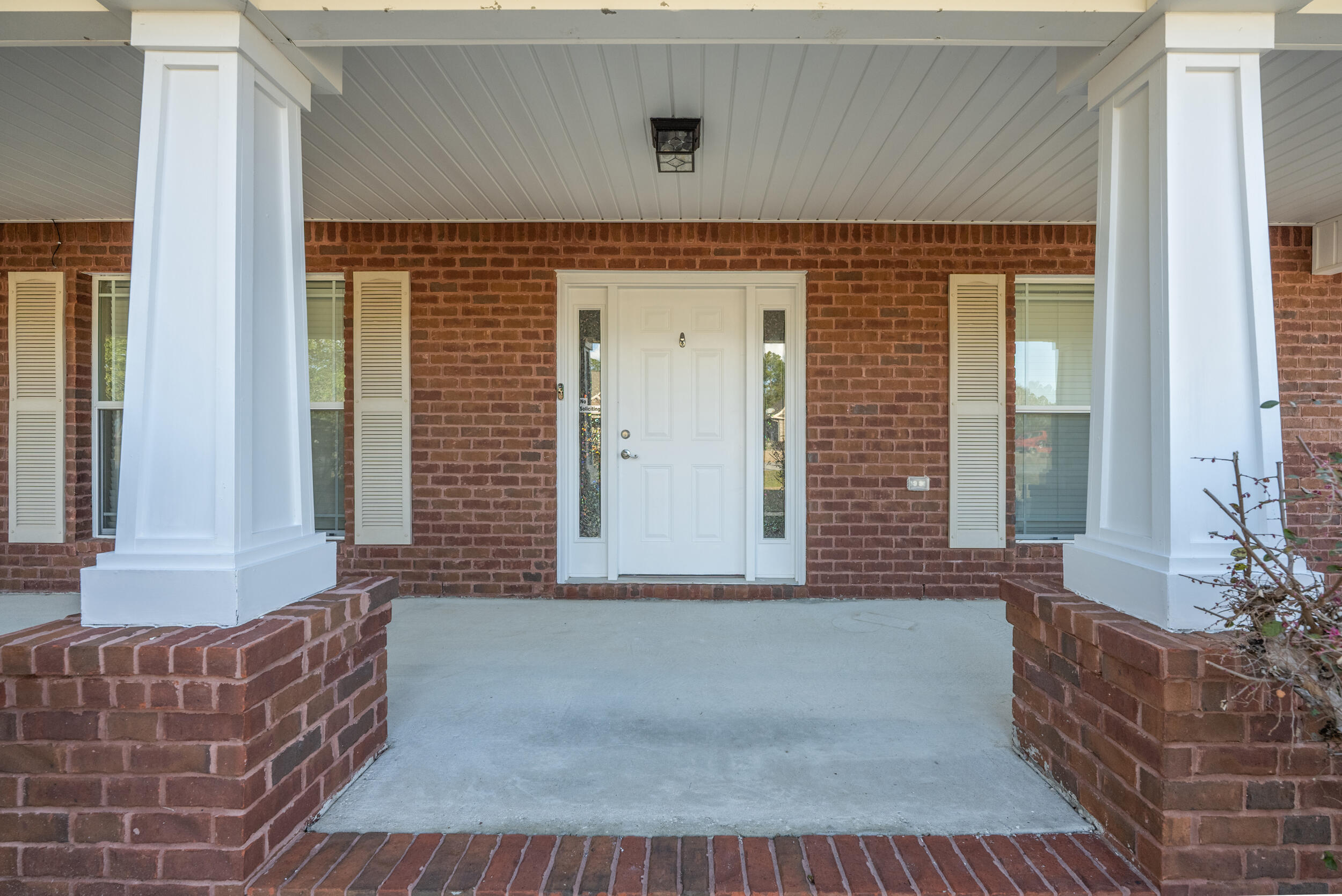 6210 Lapis Lane Crestview, FL 32539 - Photo 4 of 72 a front view of a house with a white door