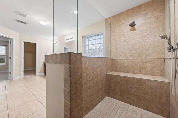 a bathroom with a sink toilet and a mirror