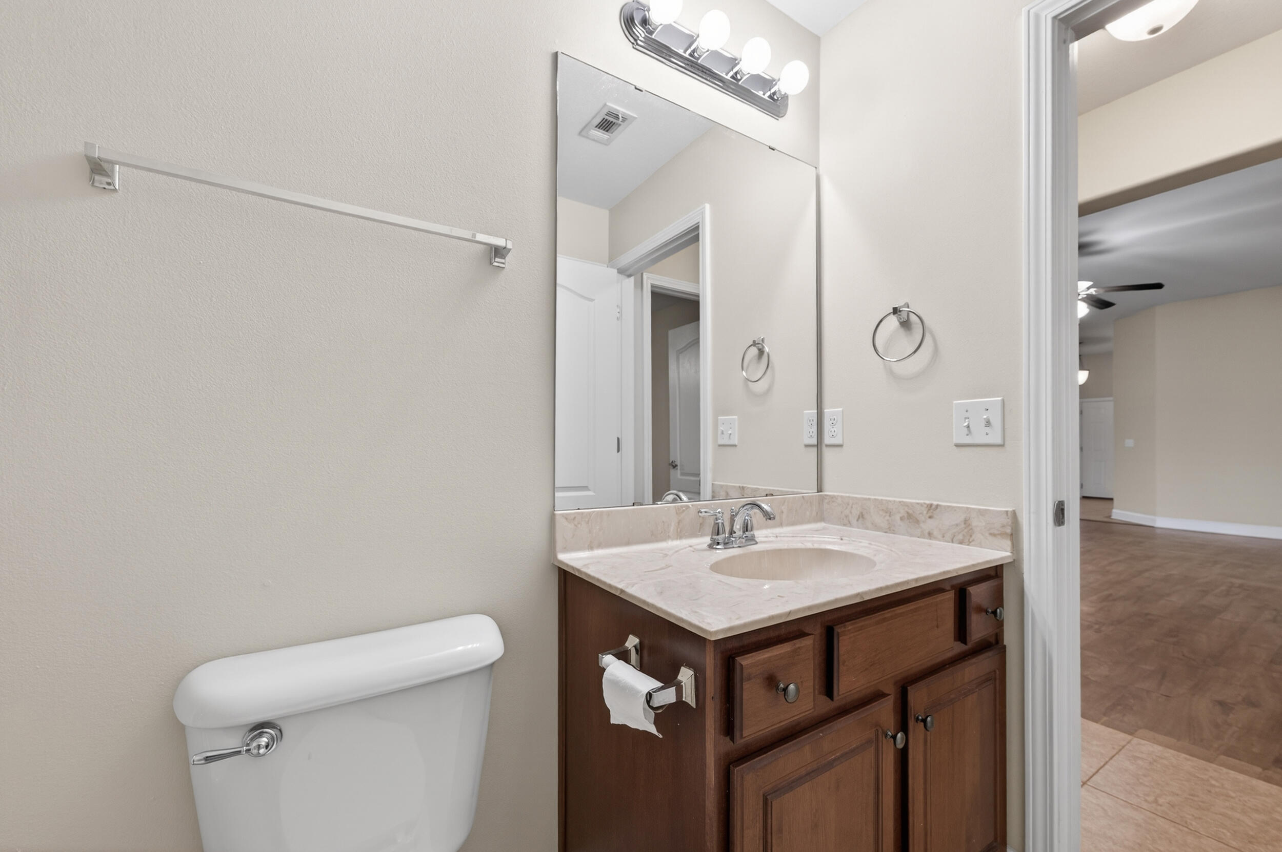 6210 Lapis Lane Crestview, FL 32539 - Photo 48 of 72 a bathroom with a sink a toilet and shower