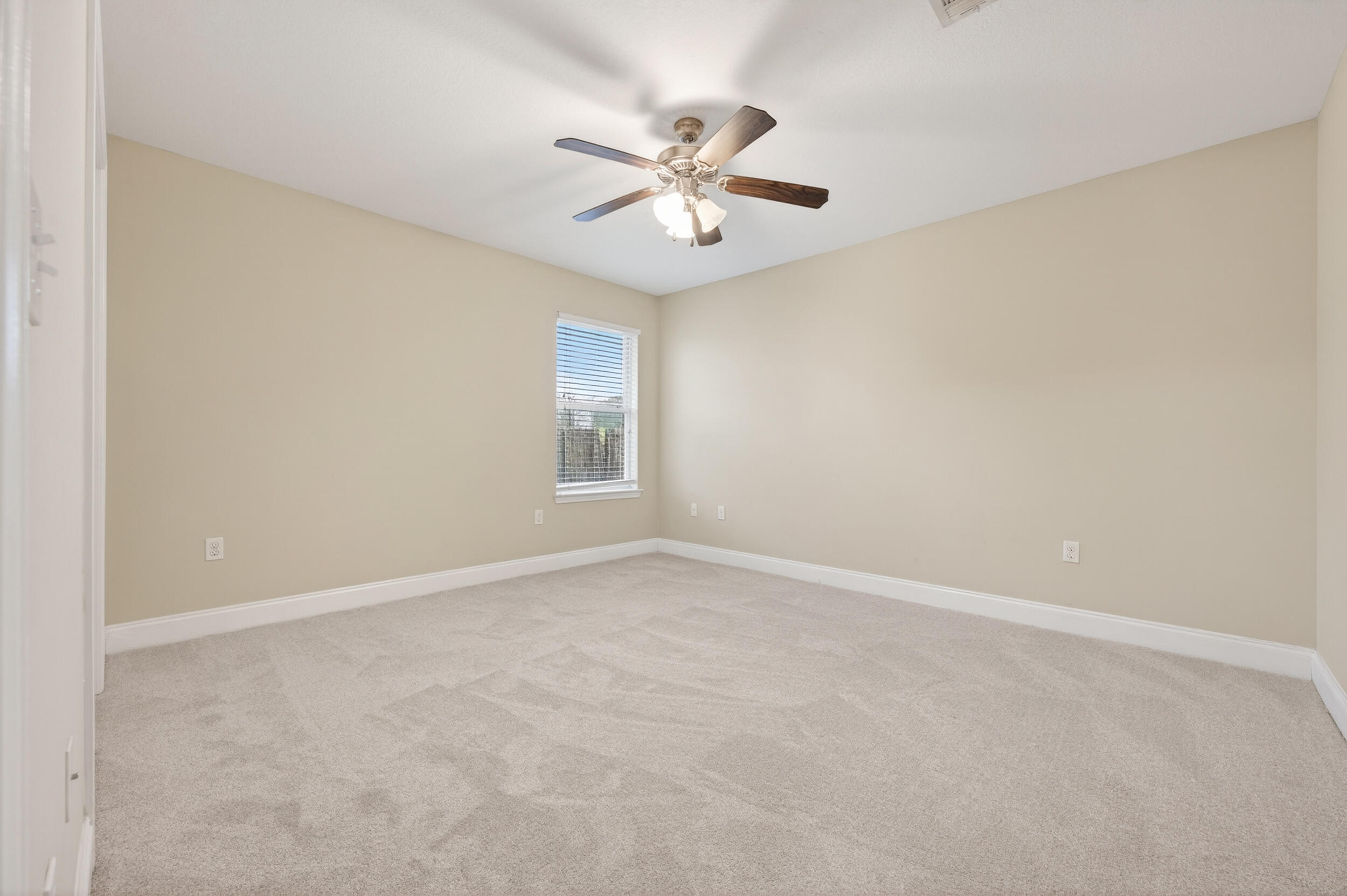 6210 Lapis Lane Crestview, FL 32539 - Photo 54 of 72 a view of an empty room with a window