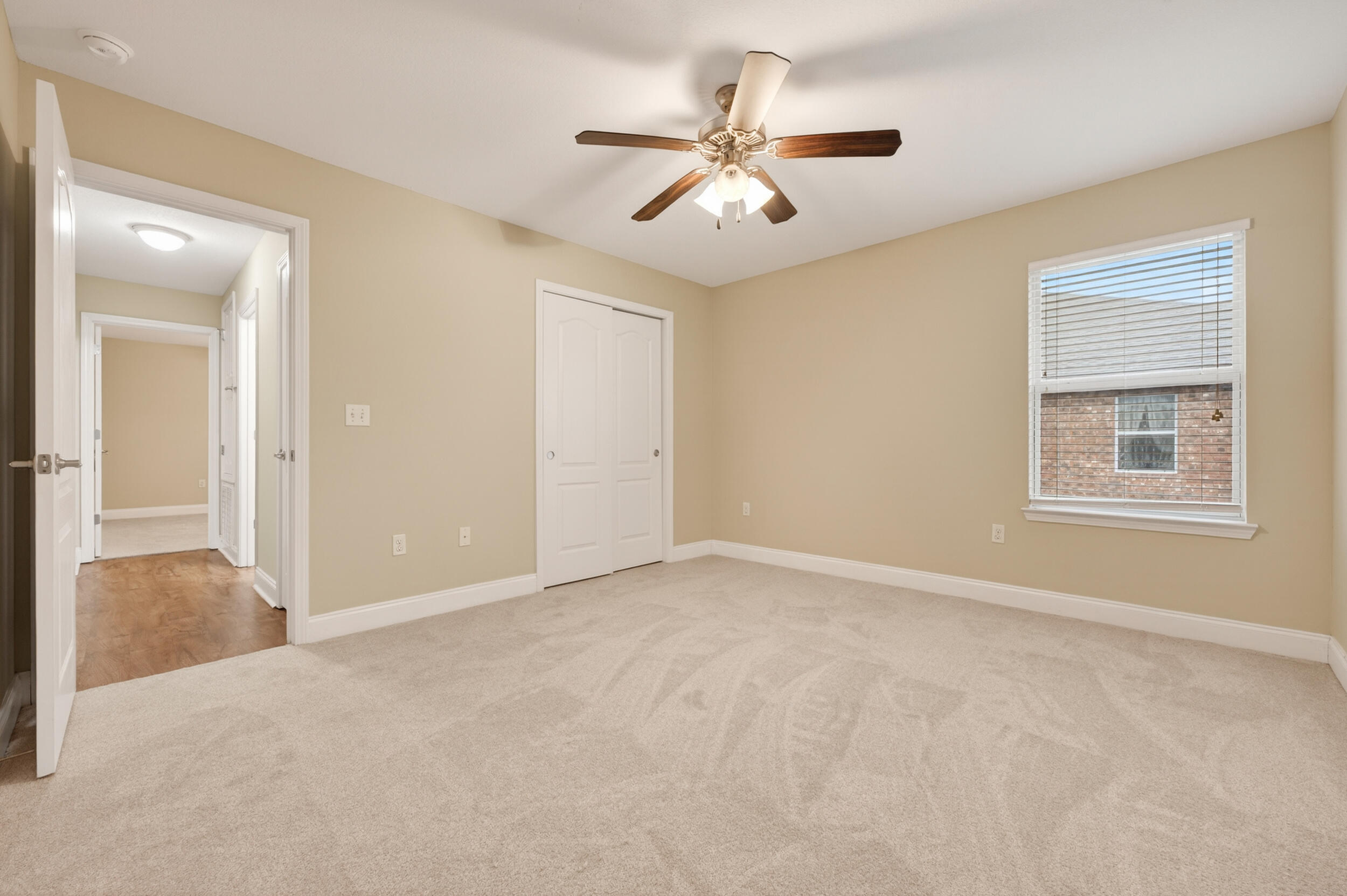6210 Lapis Lane Crestview, FL 32539 - Photo 55 of 72 a view of a livingroom with a ceiling fan and window