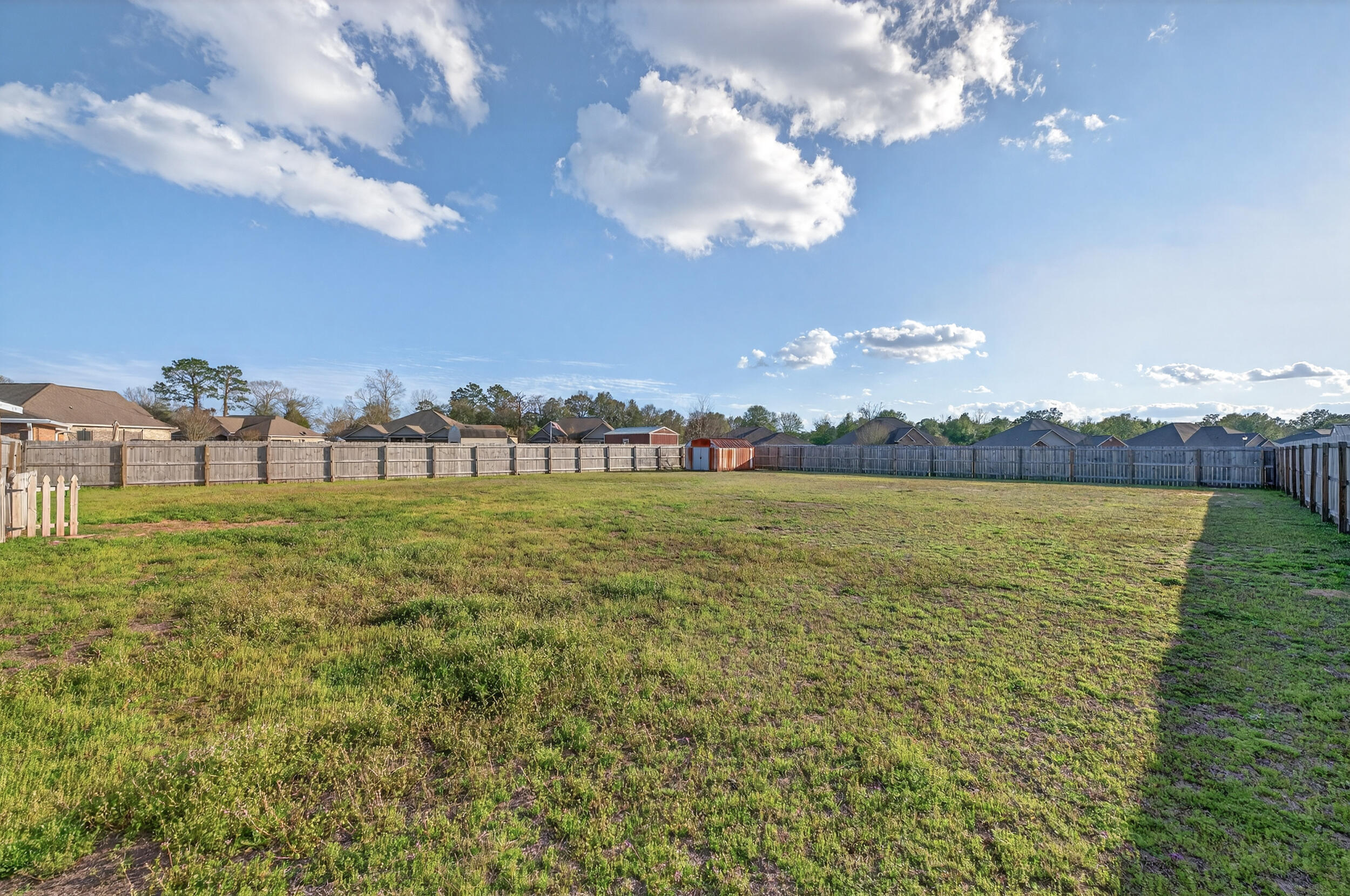 6210 Lapis Lane Crestview, FL 32539 - Photo 65 of 72 a view of a city with lots of residential buildings in the background