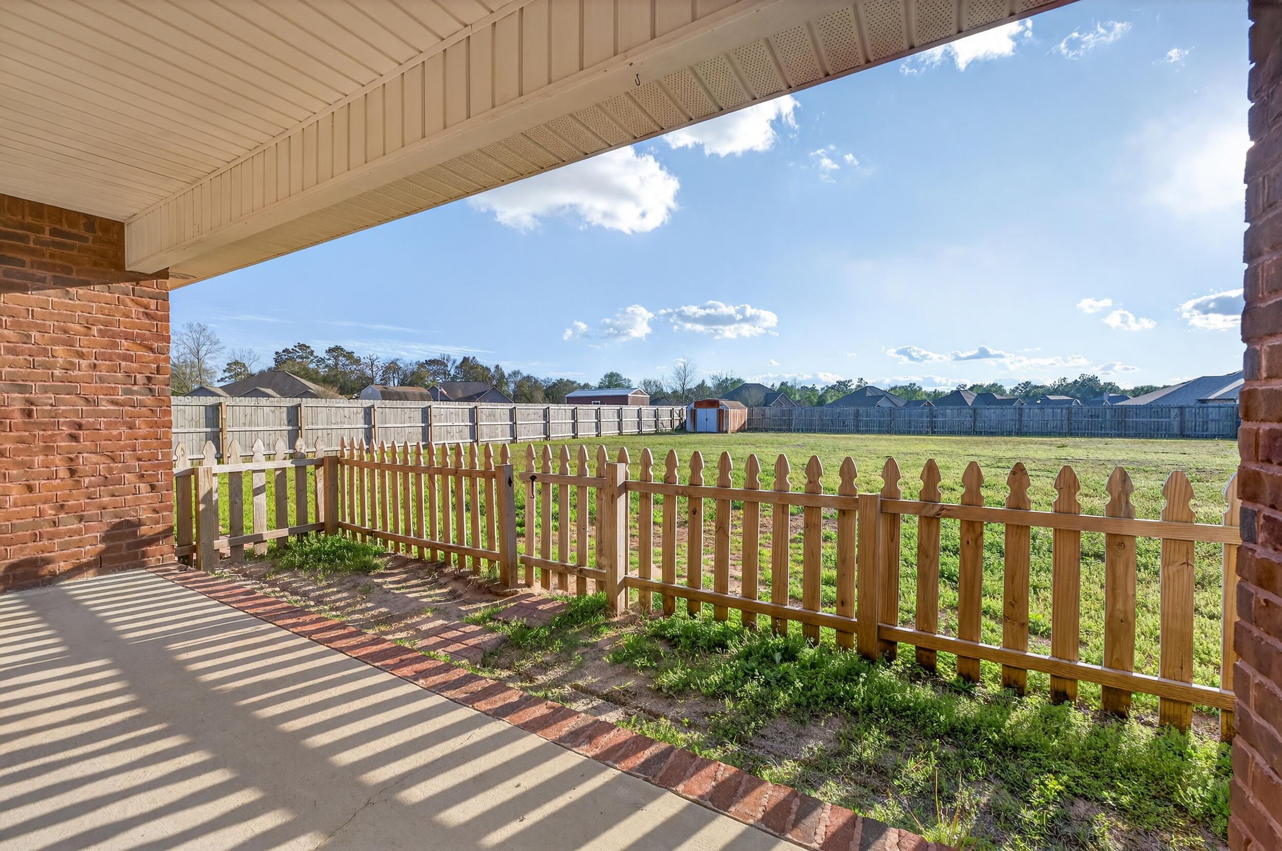 6210 Lapis Lane Crestview, FL 32539 - Photo 69 of 72 a view of a balcony with outdoor space and lake view