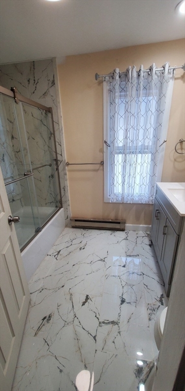 44 Clark Street, Unit 44 Lynn, MA 01902 - Photo 8 of 10 a view of shower and a sink