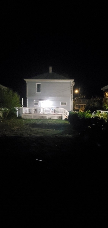 44 Clark Street, Unit 44 Lynn, MA 01902 - Photo 10 of 10 a front view of a house with a yard