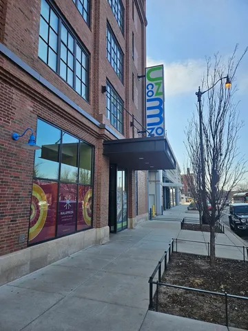 a view of a building with a street