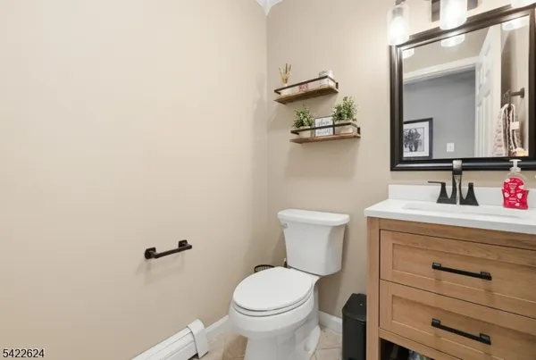 a bedroom with bed couch and window