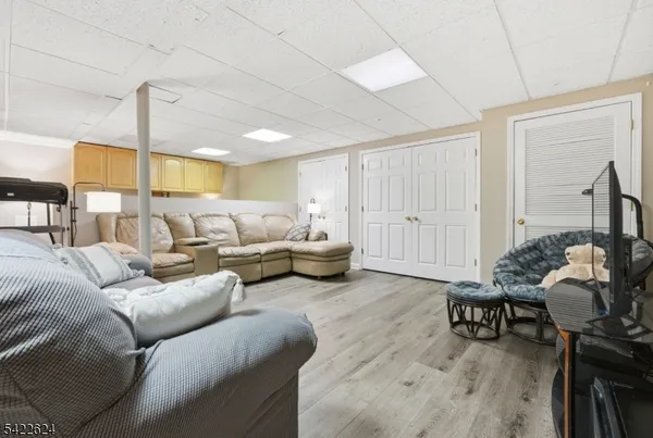 a view of deck with furniture and barbeque