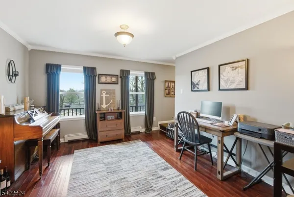 a kitchen with stainless steel appliances granite countertop wooden cabinets stove top oven and sink
