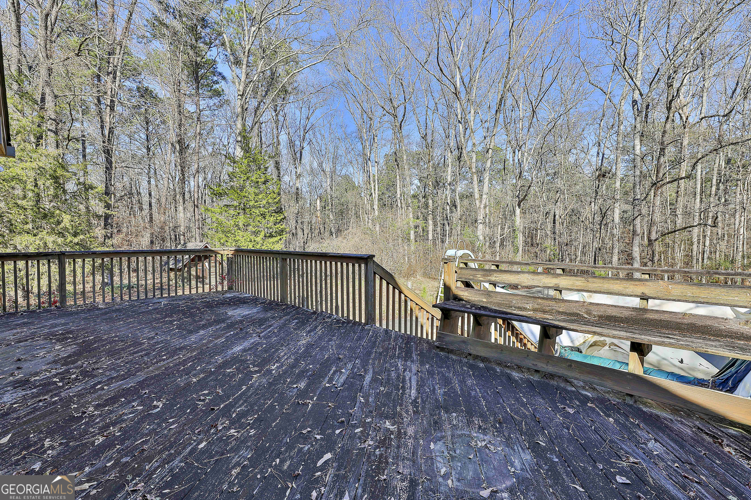 161 Mockingbird Lane Brooks, GA 30205 - Photo 22 of 57 a view of a yard with wooden fence