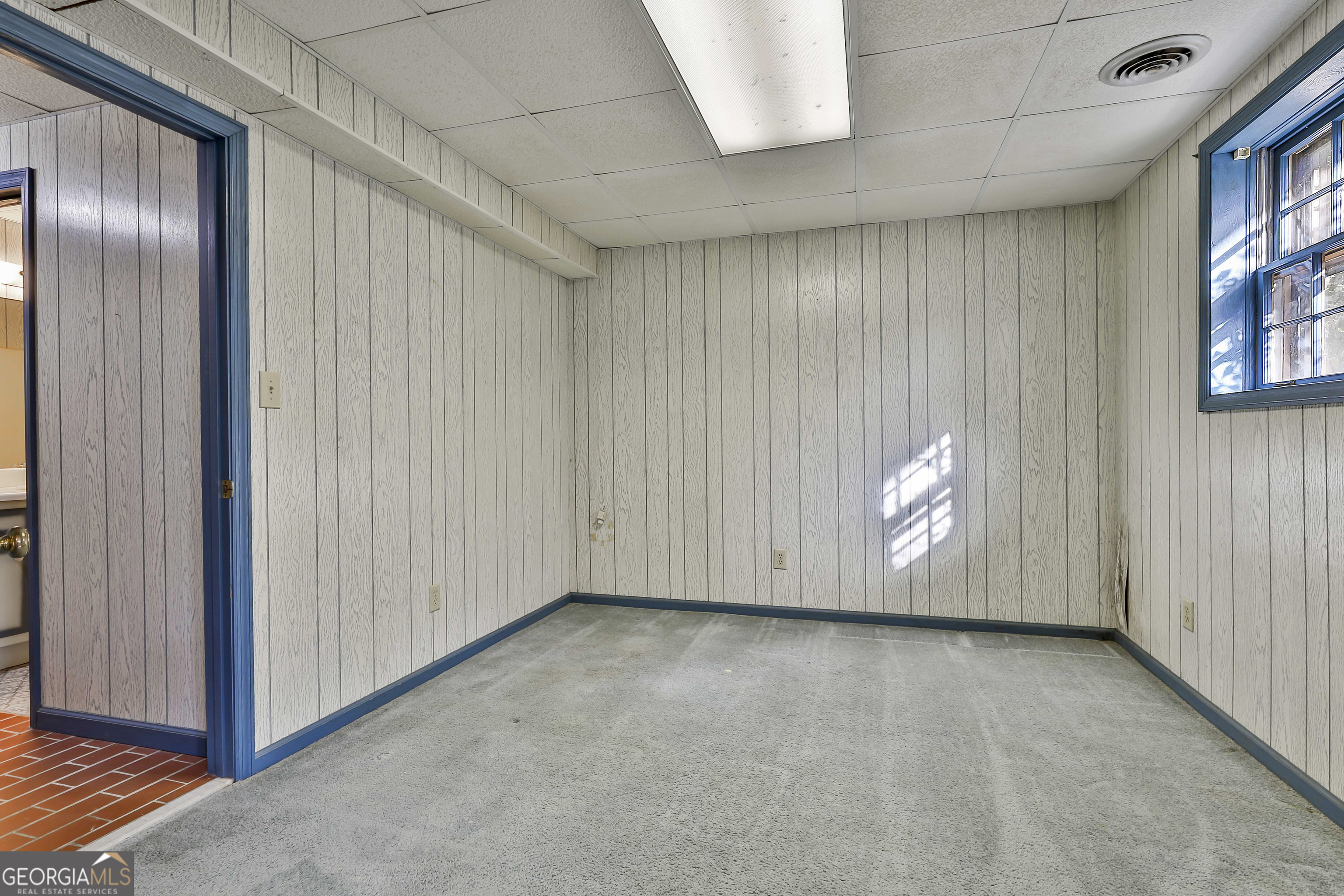 161 Mockingbird Lane Brooks, GA 30205 - Photo 36 of 57 a view of an empty room with a window