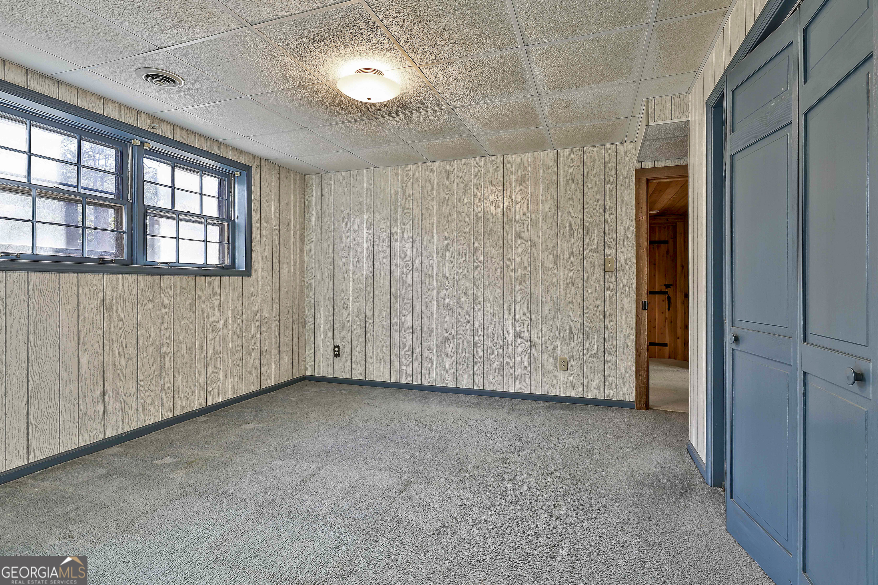 161 Mockingbird Lane Brooks, GA 30205 - Photo 38 of 57 an empty room with windows