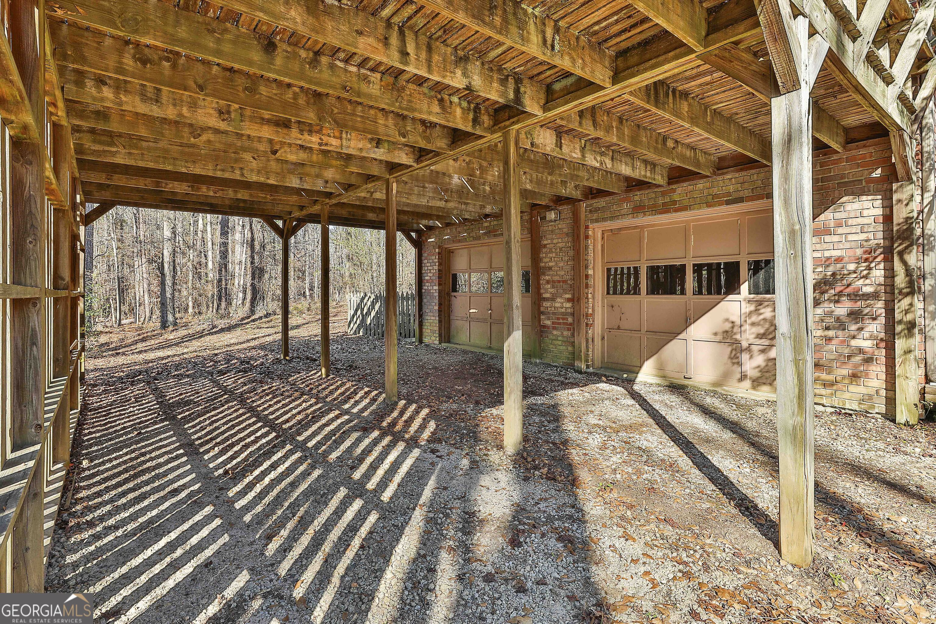 161 Mockingbird Lane Brooks, GA 30205 - Photo 41 of 57 a view of a porch with wooden floor