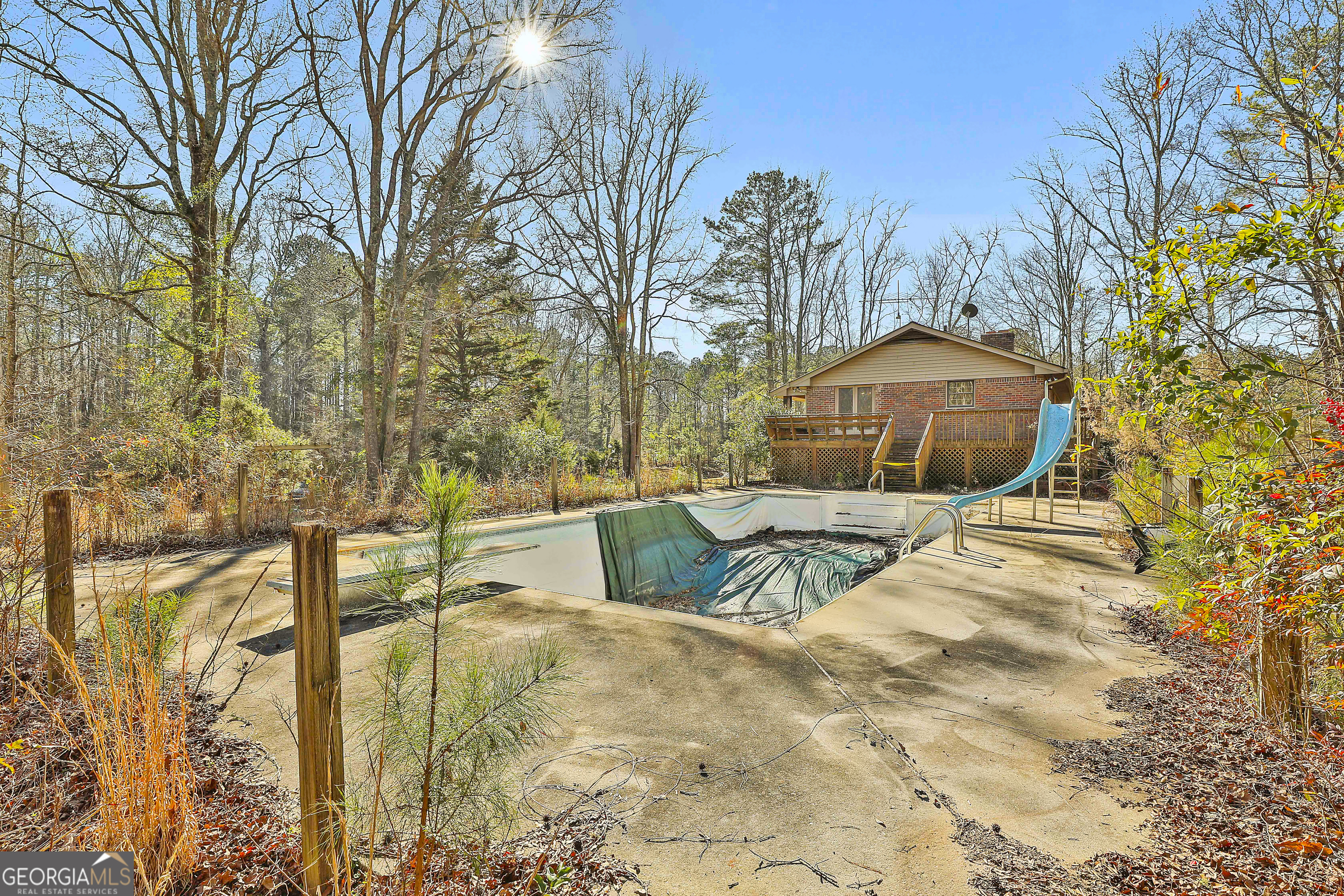 161 Mockingbird Lane Brooks, GA 30205 - Photo 48 of 57 a view of a swimming pool with a patio