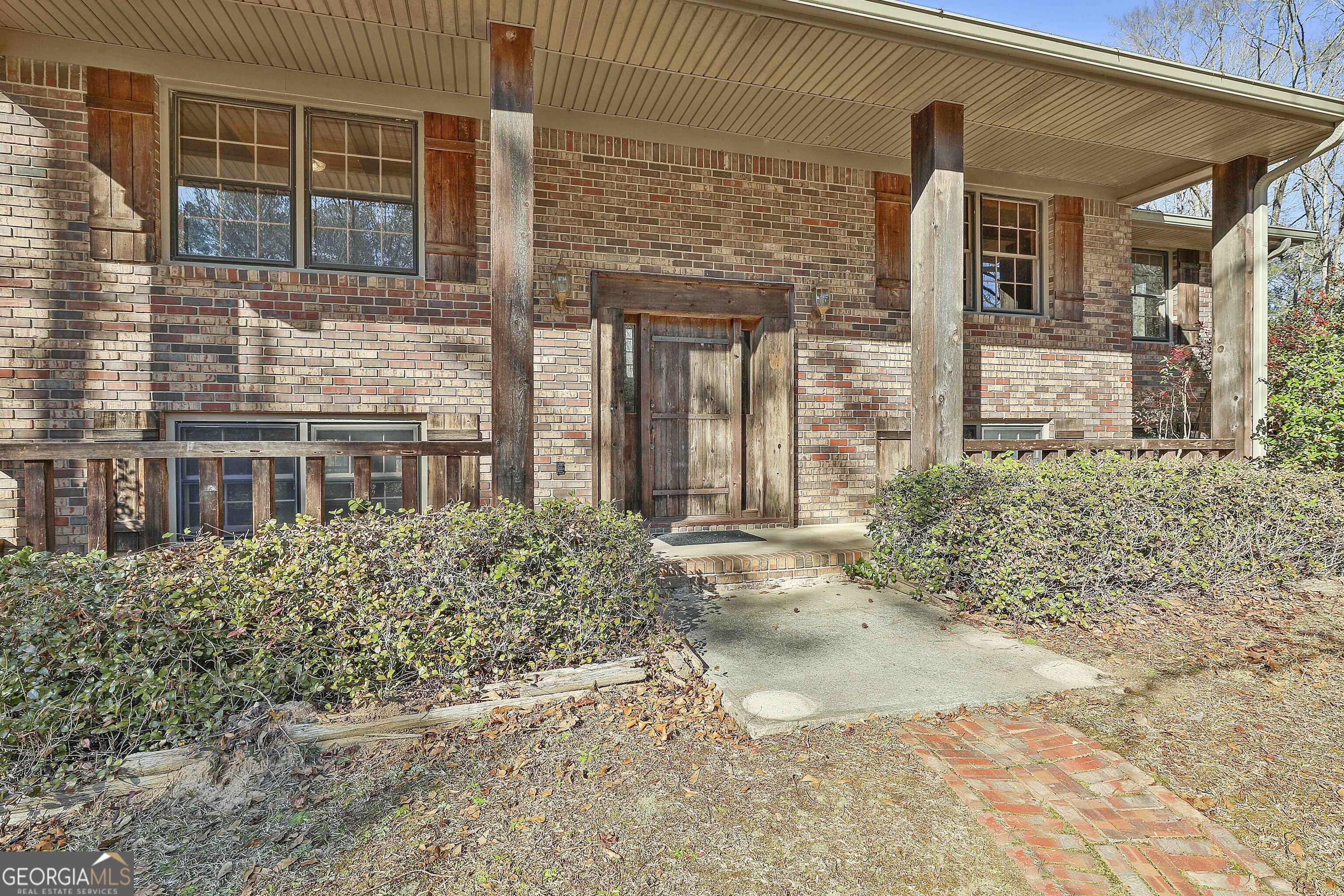 161 Mockingbird Lane Brooks, GA 30205 - Photo 9 of 57 front view of a house with a yard