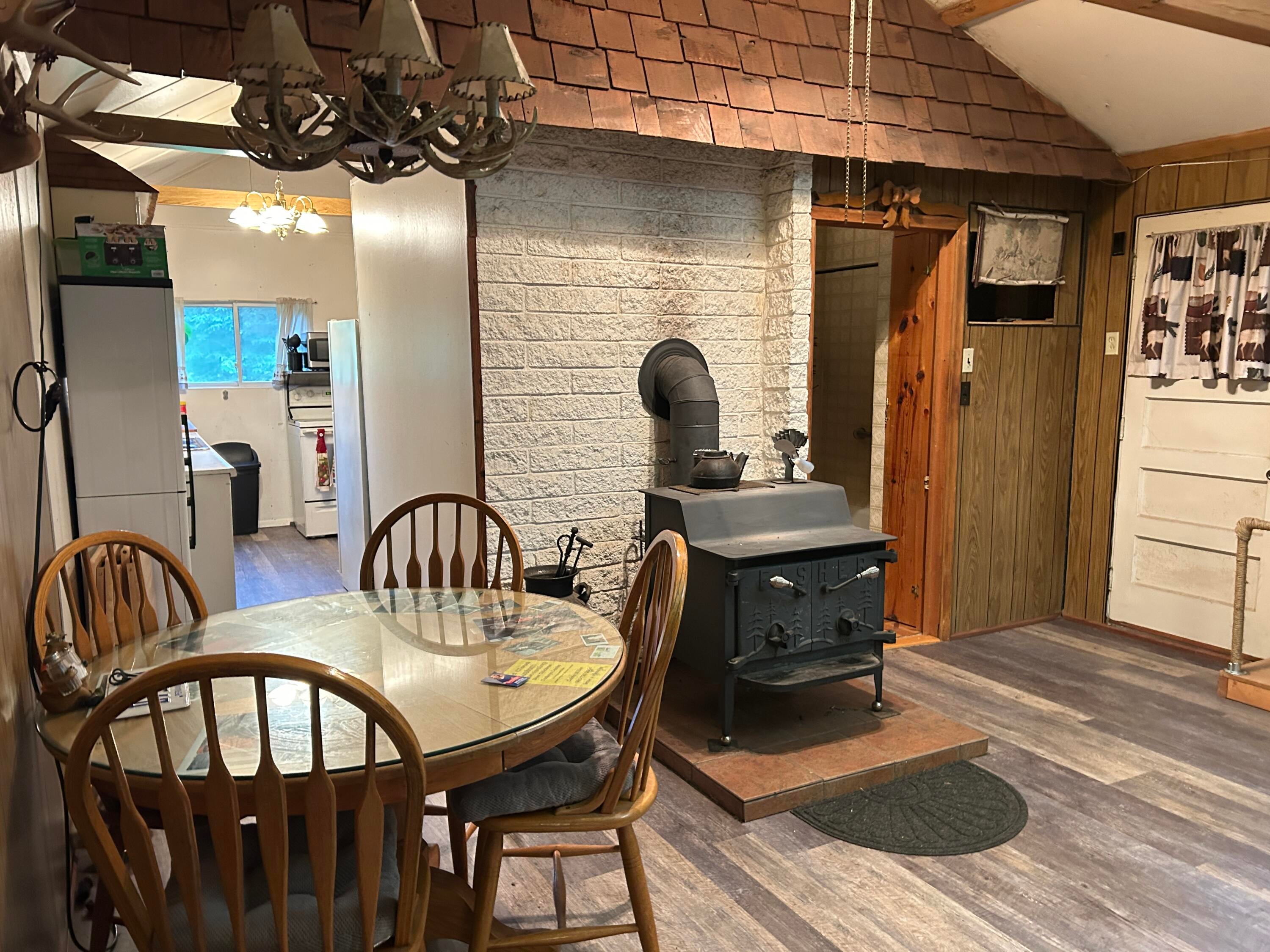 16831 Moores Landing Road Lachine, MI 49753 - Photo 16 of 33 Wood stove