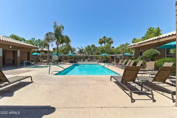 a view of balcony with wooden floor