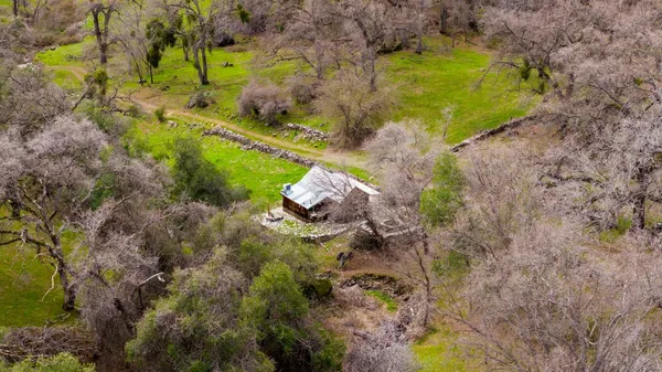 a backyard of a house with lots of green space