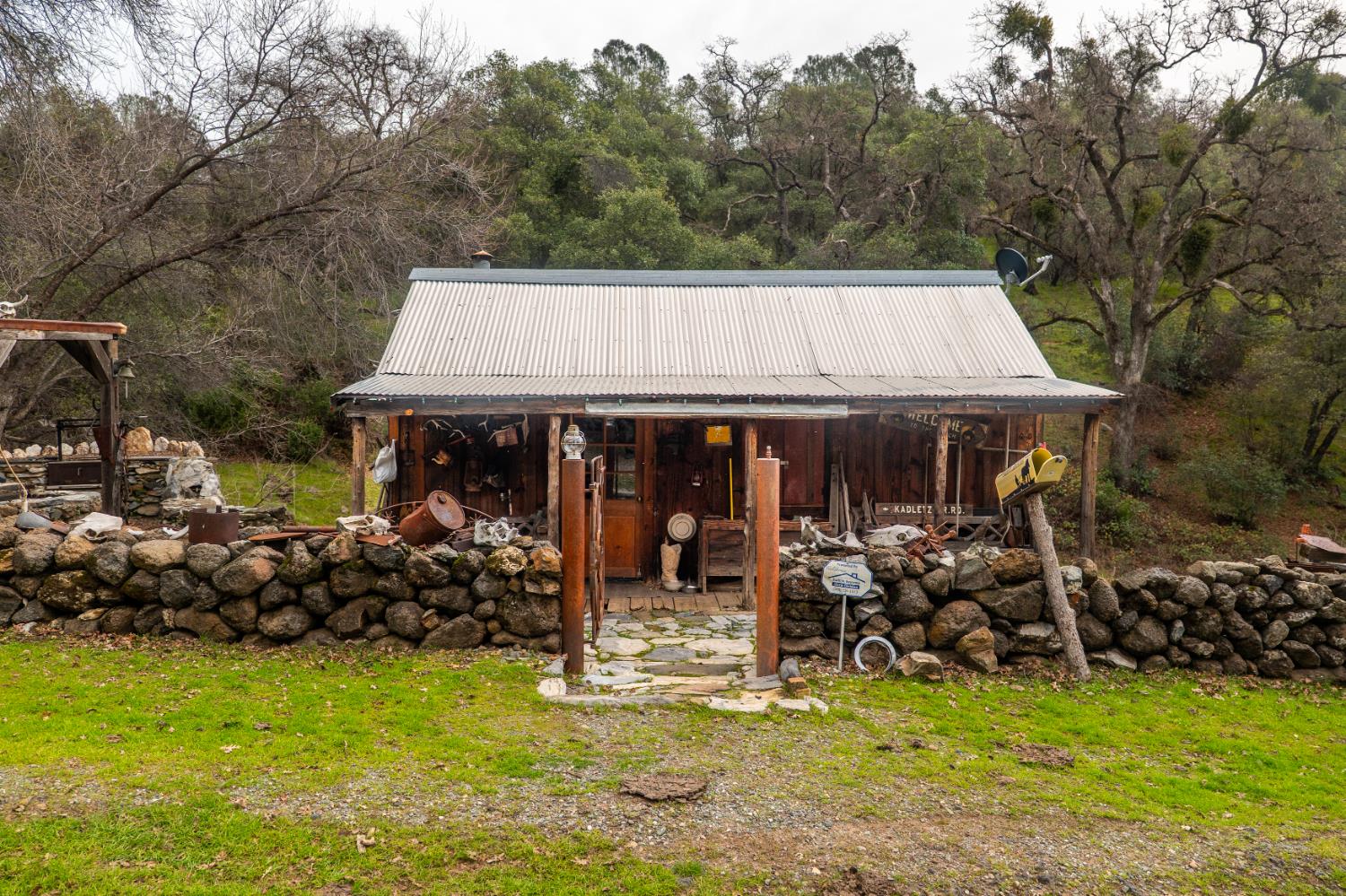 0 Skunk Gulch Road Murphys, CA 95247 - Photo 26 of 67 a view of a chair and tables in the backyard of the house