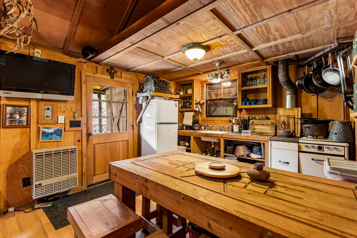 0 Skunk Gulch Road Murphys, CA 95247 - Photo 28 of 67 a view of a dining room with furniture window and wooden floor
