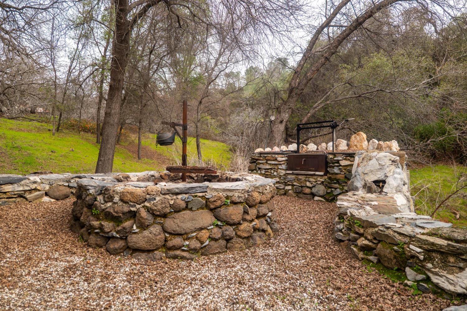 0 Skunk Gulch Road Murphys, CA 95247 - Photo 32 of 67 a view of swimming pool with outdoor seating and covered with trees