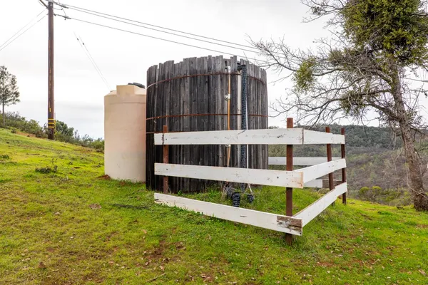 a view of mountain and a mountain in the background