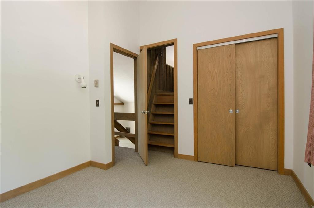 65 Andersen Road Raymond, ME 04071 - Photo 27 of 35 Second bedroom with stairs to "loft."