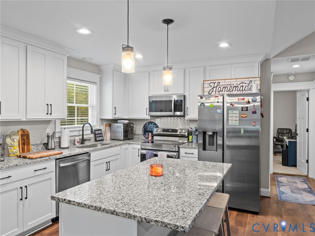10819 Vaughan Road Petersburg, VA 23805 - Photo 26 of 45 Kitchen featuring white shaker-style cabinetry, gr