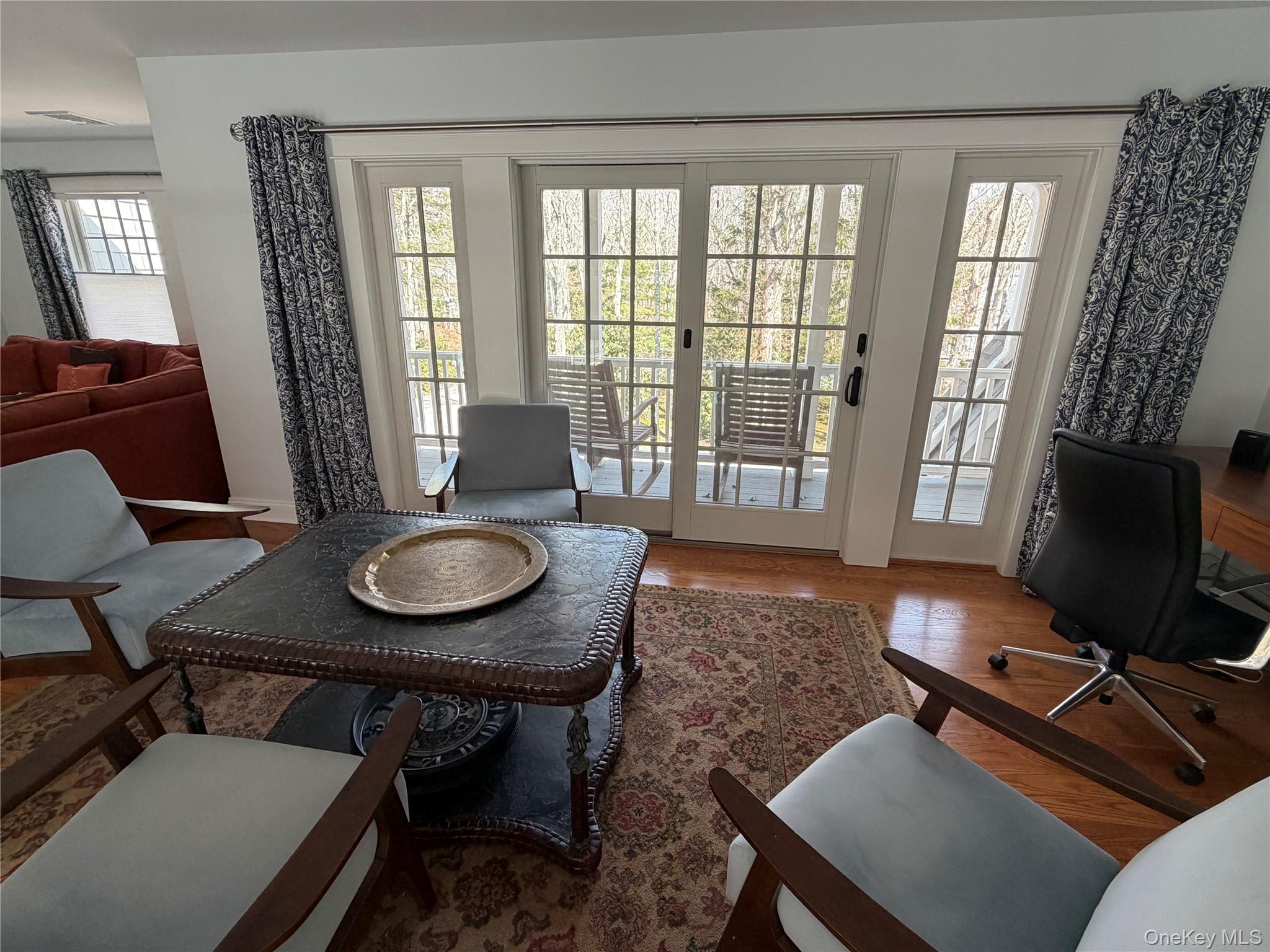 27 Deer Path Quogue, NY 11959 - Photo 5 of 44 a living room with furniture and wooden floor