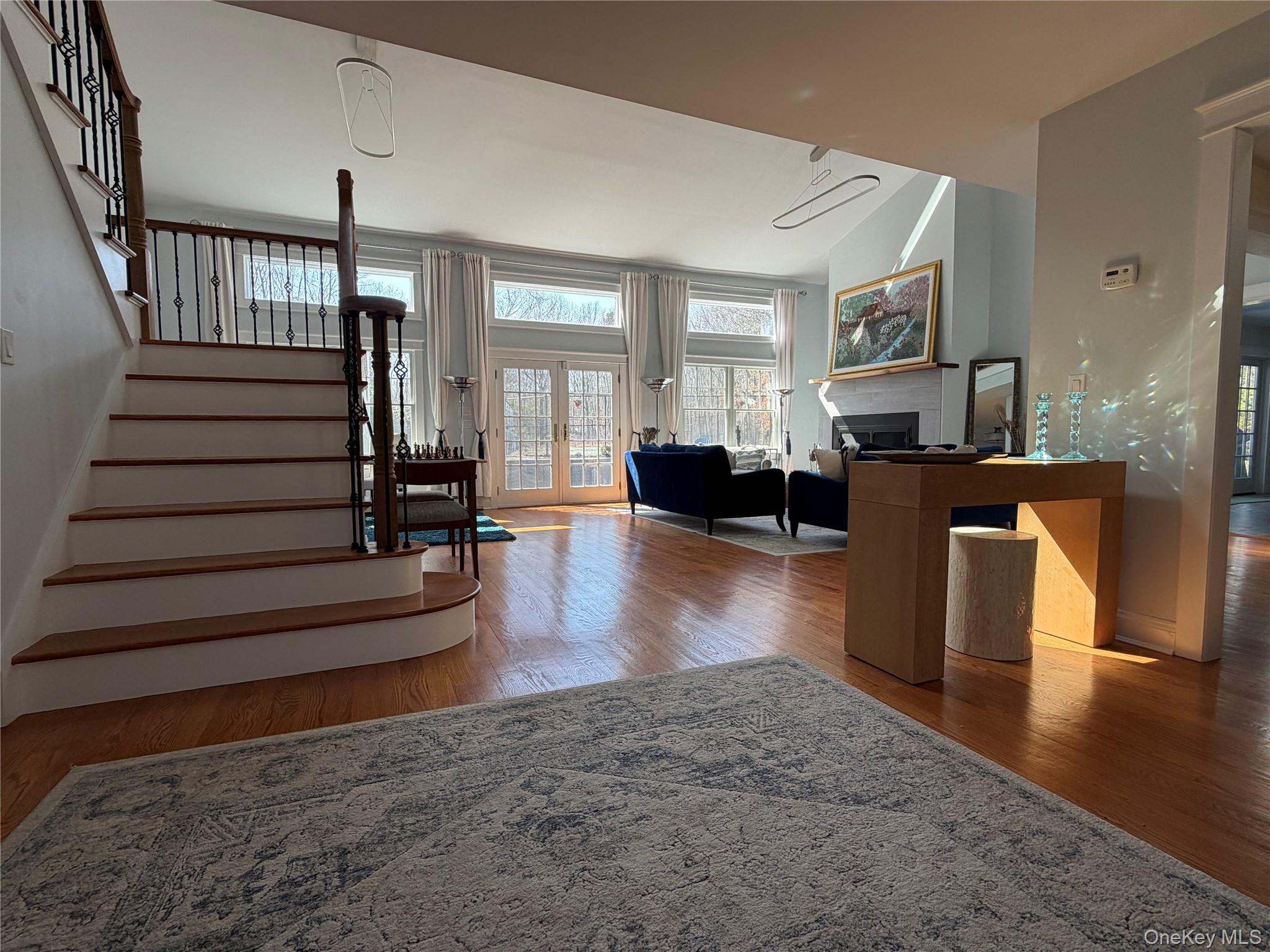 27 Deer Path Quogue, NY 11959 - Photo 7 of 44 a view of a livingroom with furniture hardwood floor and a livingroom
