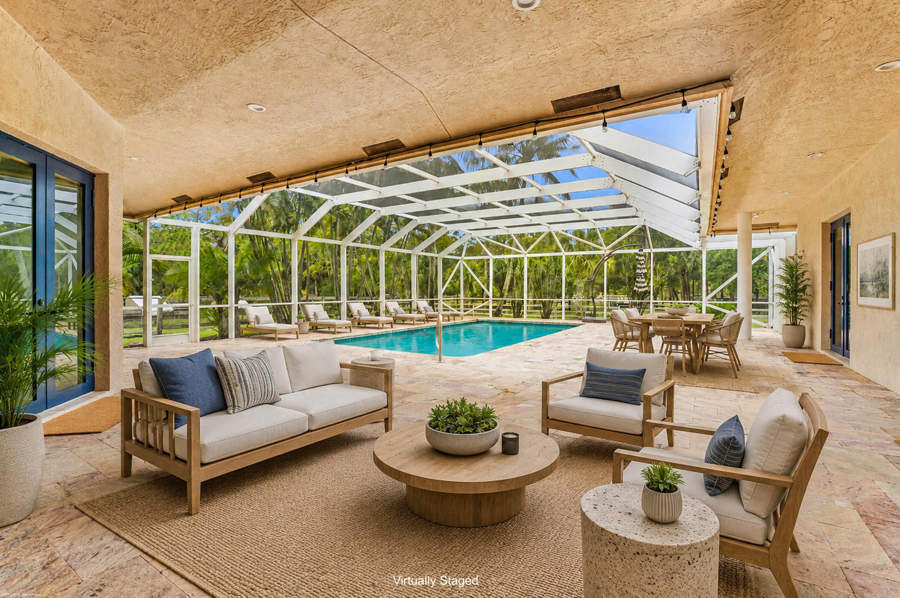 2560 Buck Ridge Trail Loxahatchee, FL 33470 - Photo 37 of 65 Covered Patio and Pool
